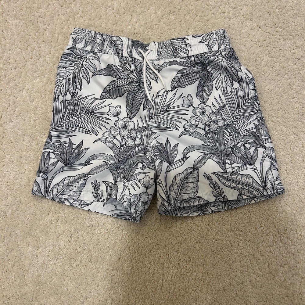 Janie and Jack Boy’s Black and White Tropical Print Swim Trunks in Size 8